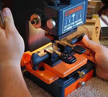 Universal Locksmith Store Geneva, IL 630-296-5750 Universal Locksmith Store Geneva, IL 630-296-5750 - 14-Key-Duplication